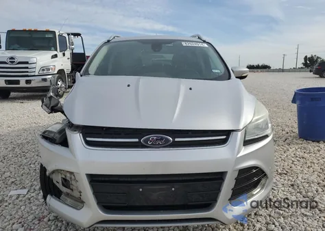 2014 Ford Escape Titanium z USA, uszkodzony, nr VIN 1FMCU0JX7EUE21660